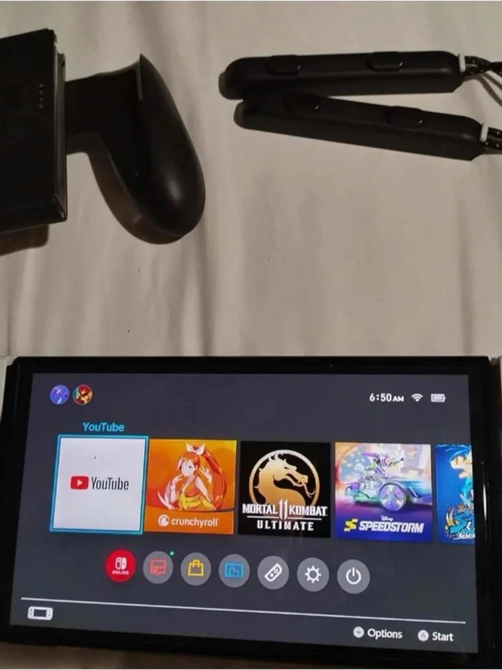 Nintendo OLED Console with White and Black Joy‑Con